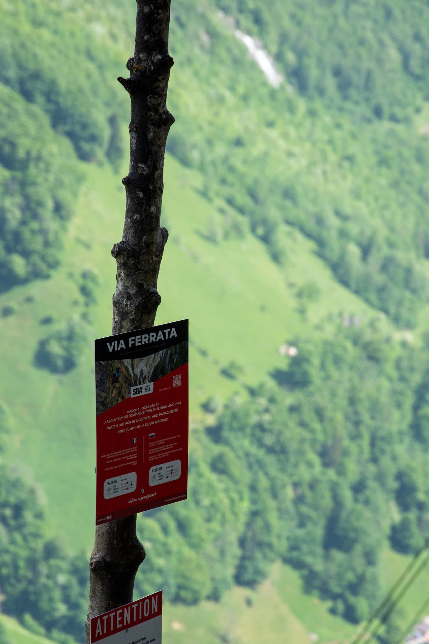 Via ferrata and safety information sign during documentary fieldwork.